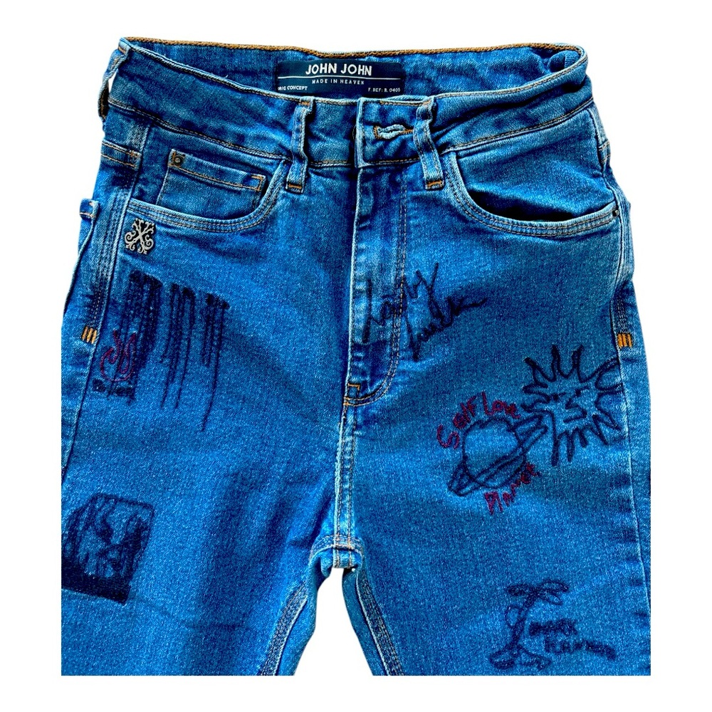 Title: Vintage-Inspired Flared Jeans with Unique Graphic Prints